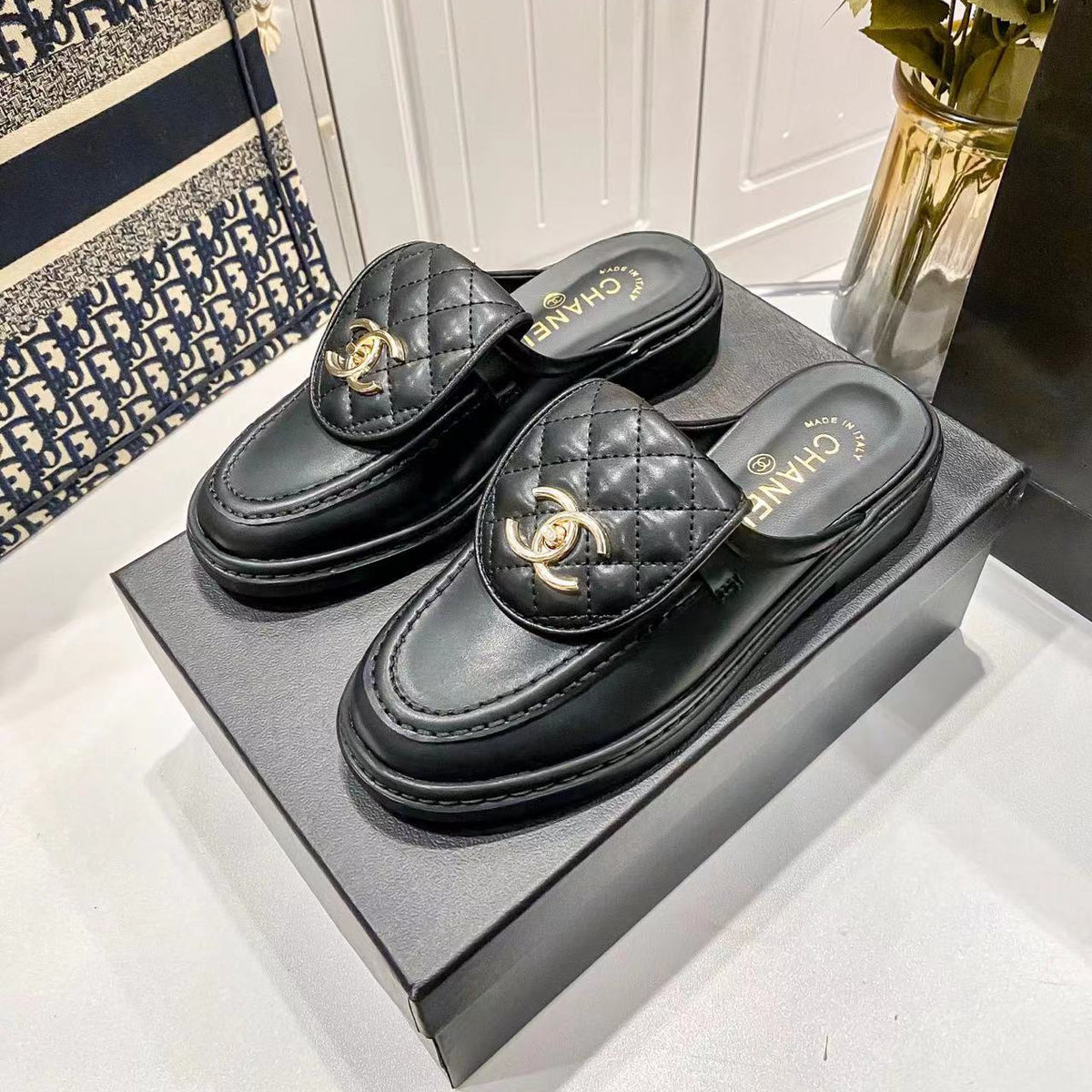 Quilted Leather Turnlock Mules